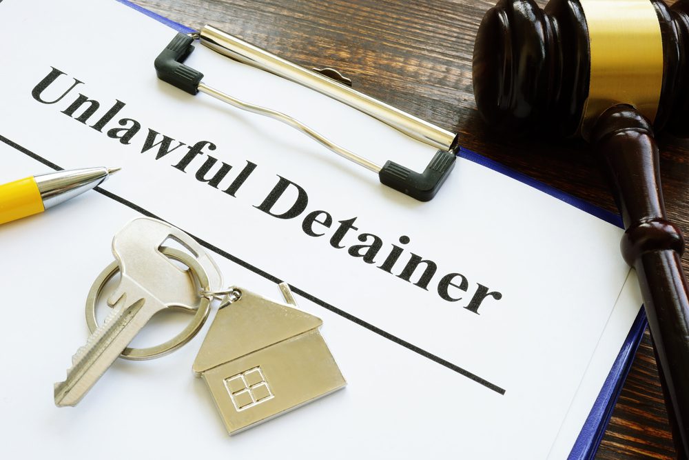 Fingerscan Digital Unlawful Detainer: clipboard and key to the house