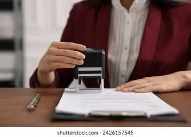 Notary stamping an employment verification letter before apostille for a Santa Clara employer