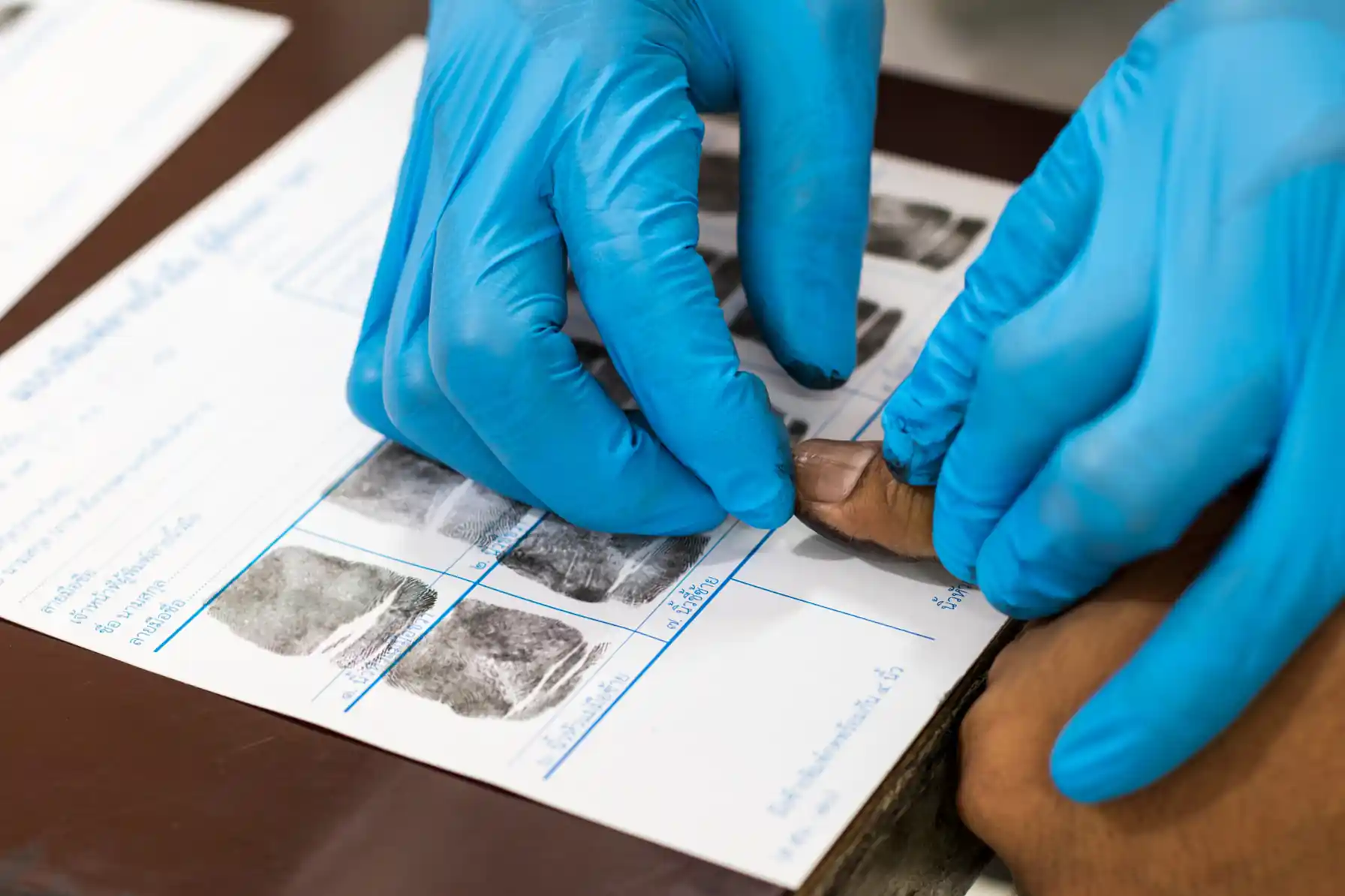 Multiple FD-258 ink cards captured in one sitting for a multi-state licensing filing