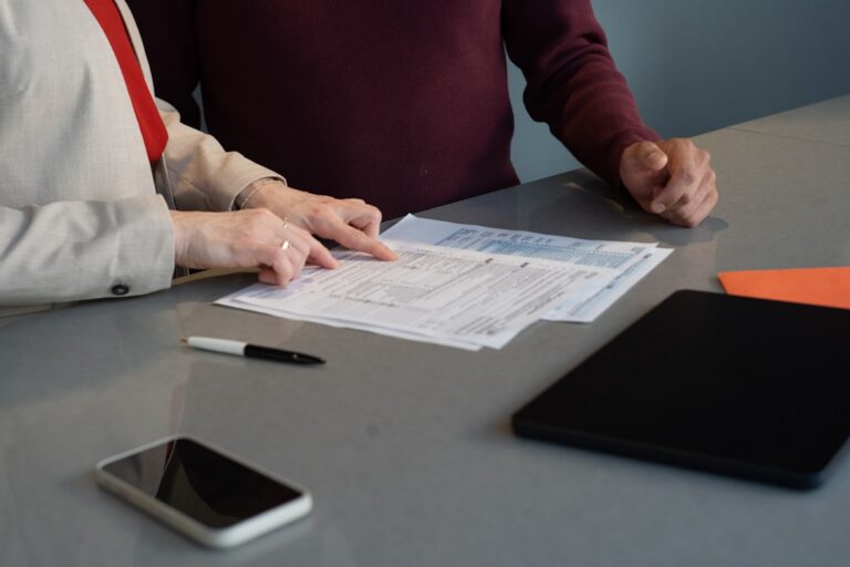 Business documents and pen on a desk, representing corporate apostille paperwork